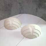 Wall sconces in stone and in the shape of a basin