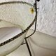 Antique rocking cradle in wrought iron