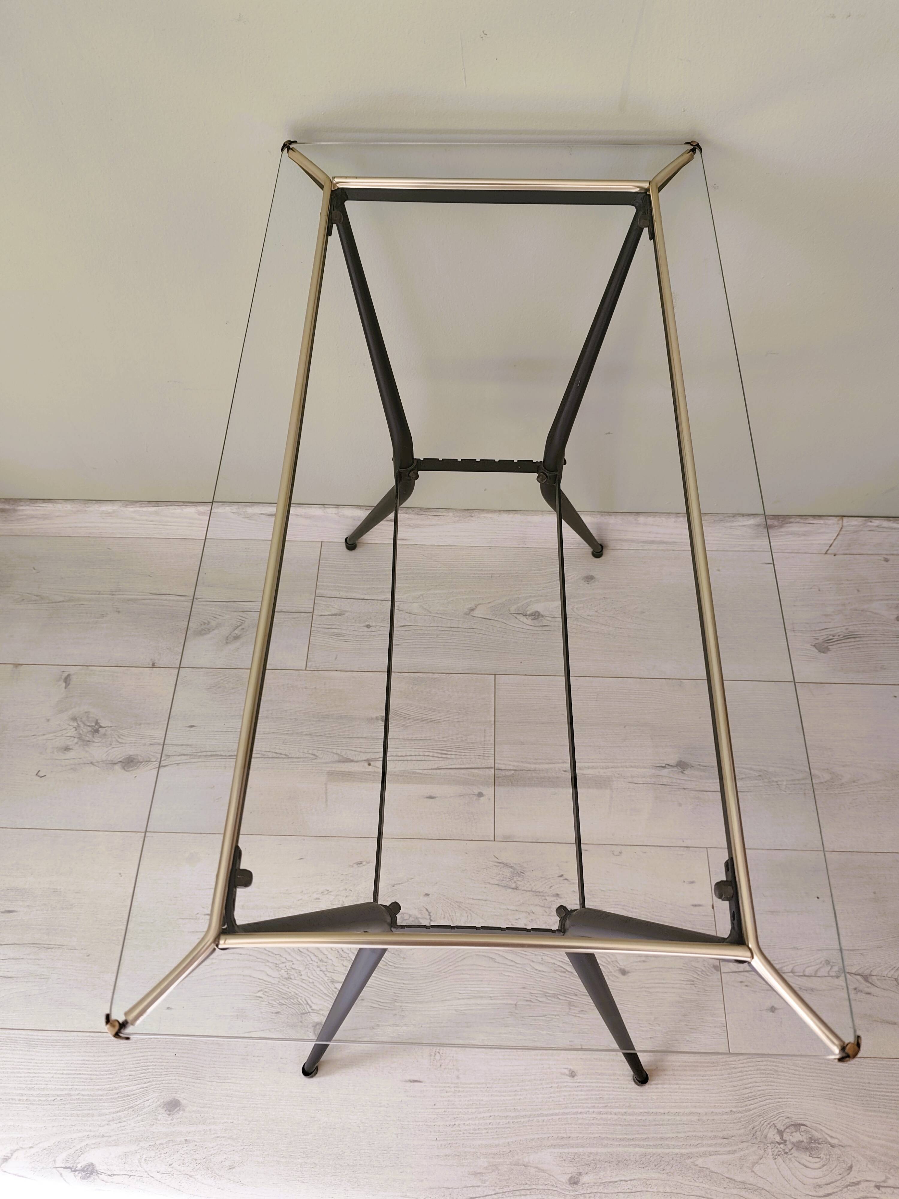 Antique side table made of metal and glass