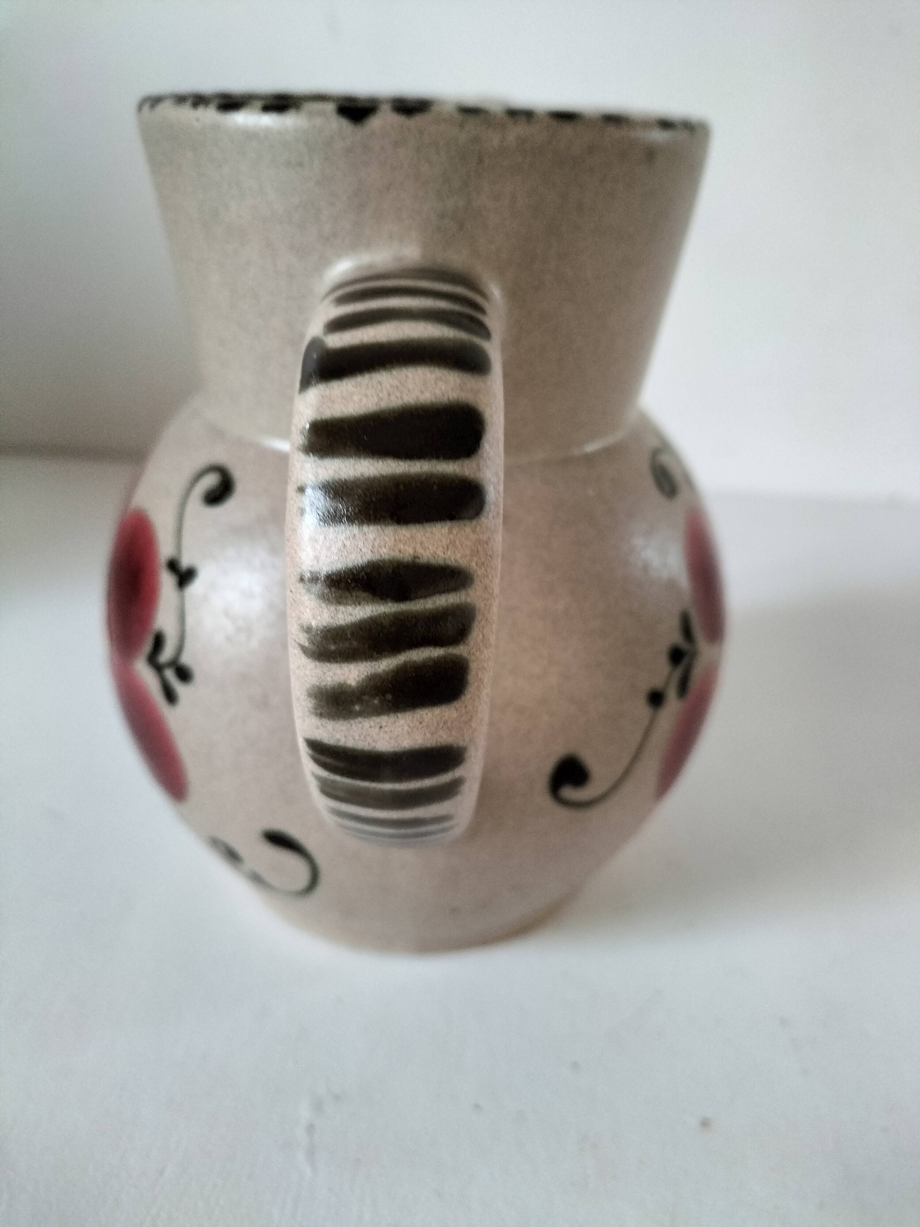 Vintage stoneware pitcher with hand-painted floral decoration, 1960s–70s