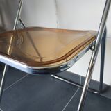 Seventies stainless steel and caramel chairs