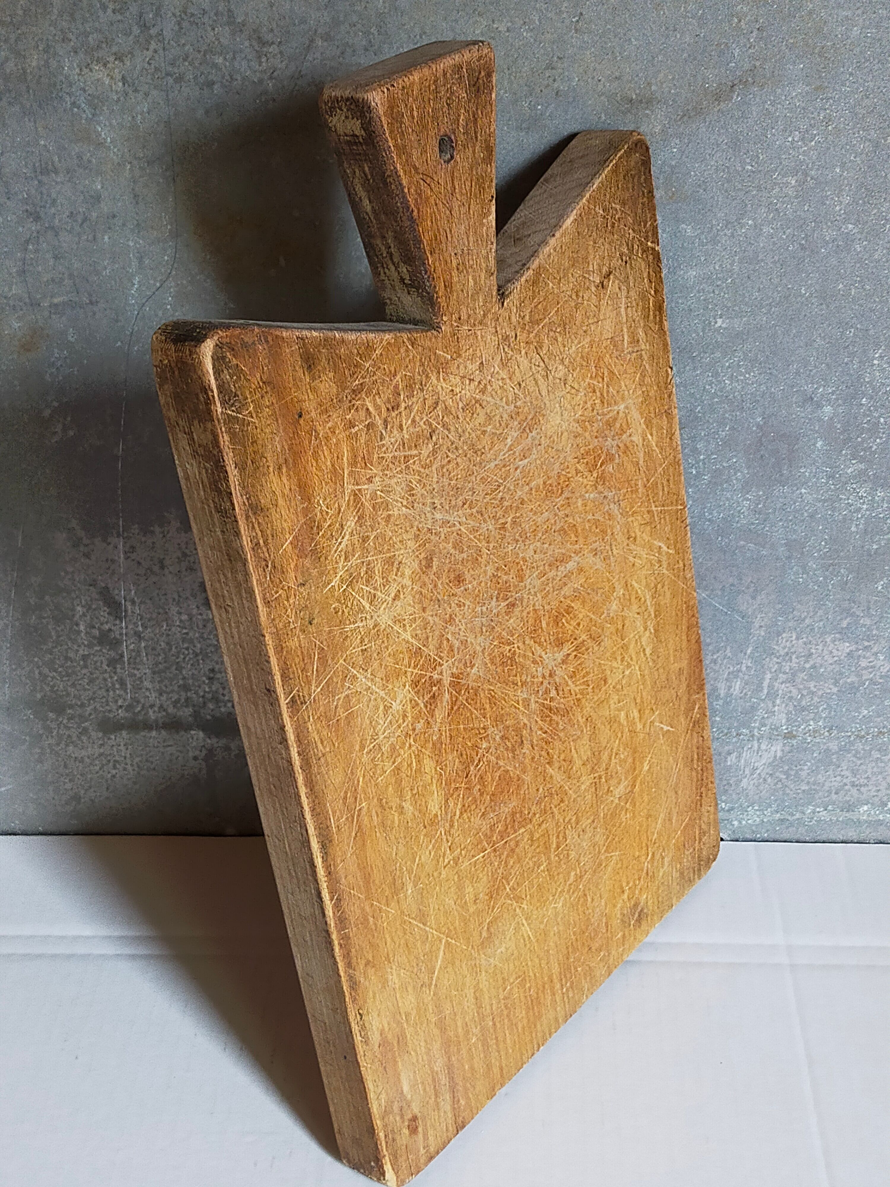 Cutting board in old solid wood