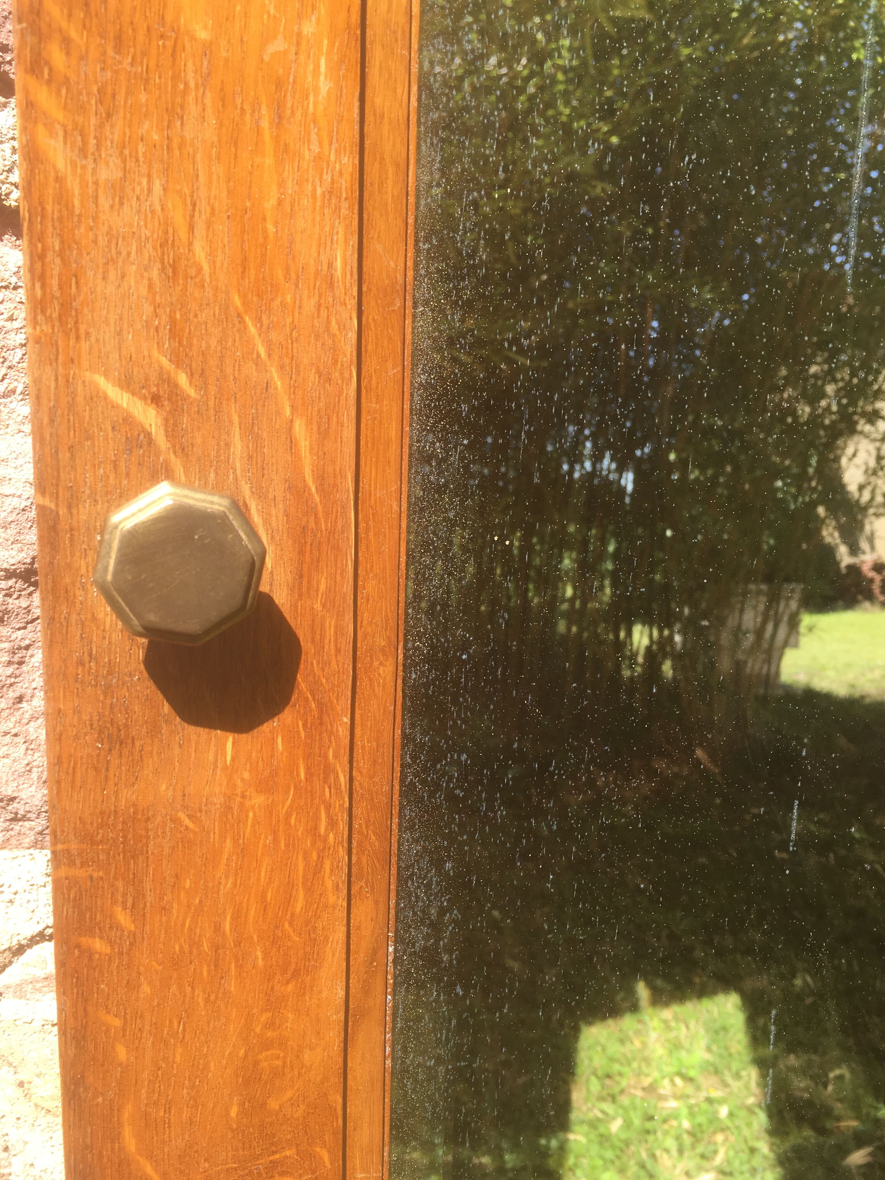 Bevelled mirror oak frame