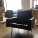 Vintage armchair in black skaï