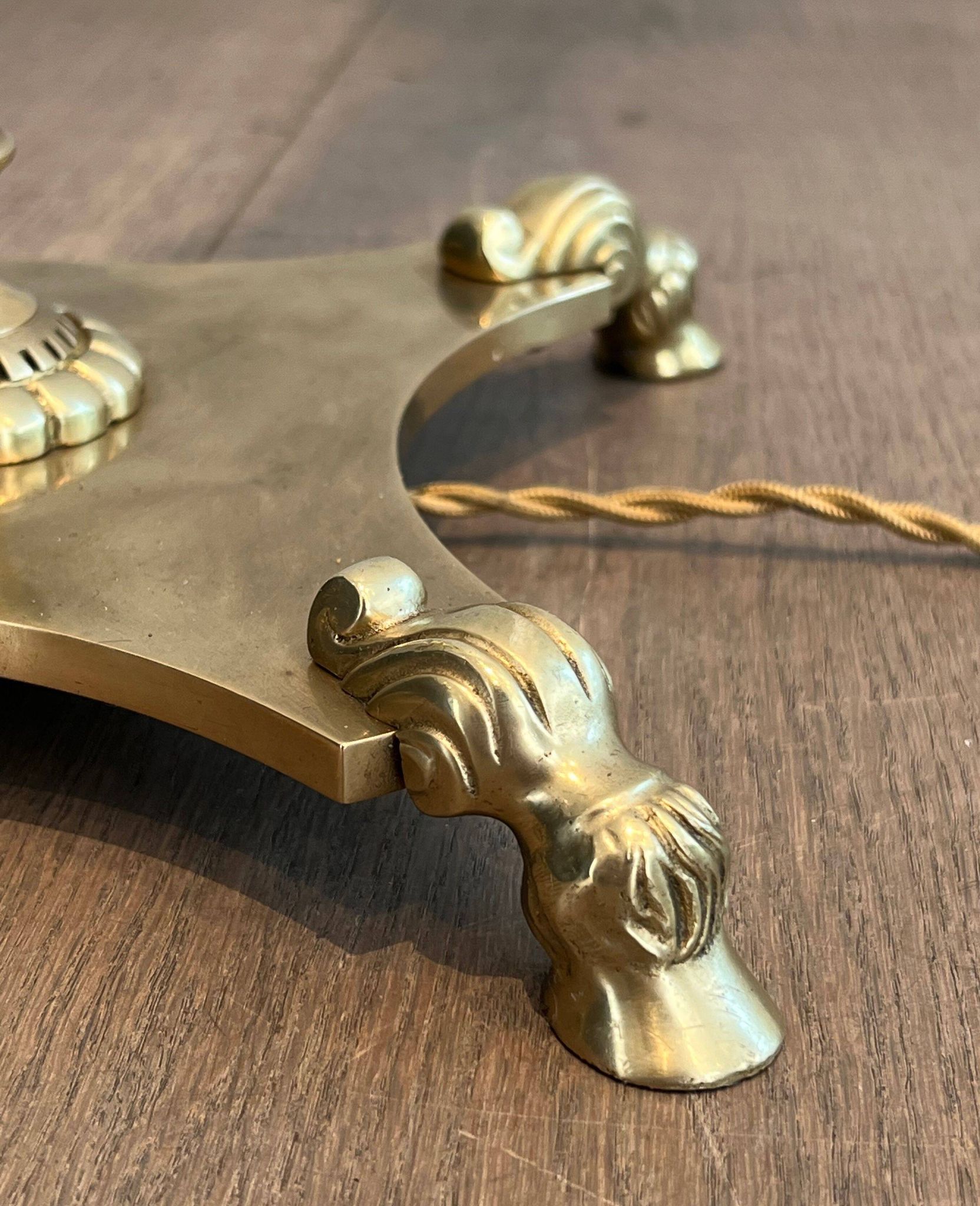 Neoclassical brass floor lamp with claw feet from Maison Jansen.