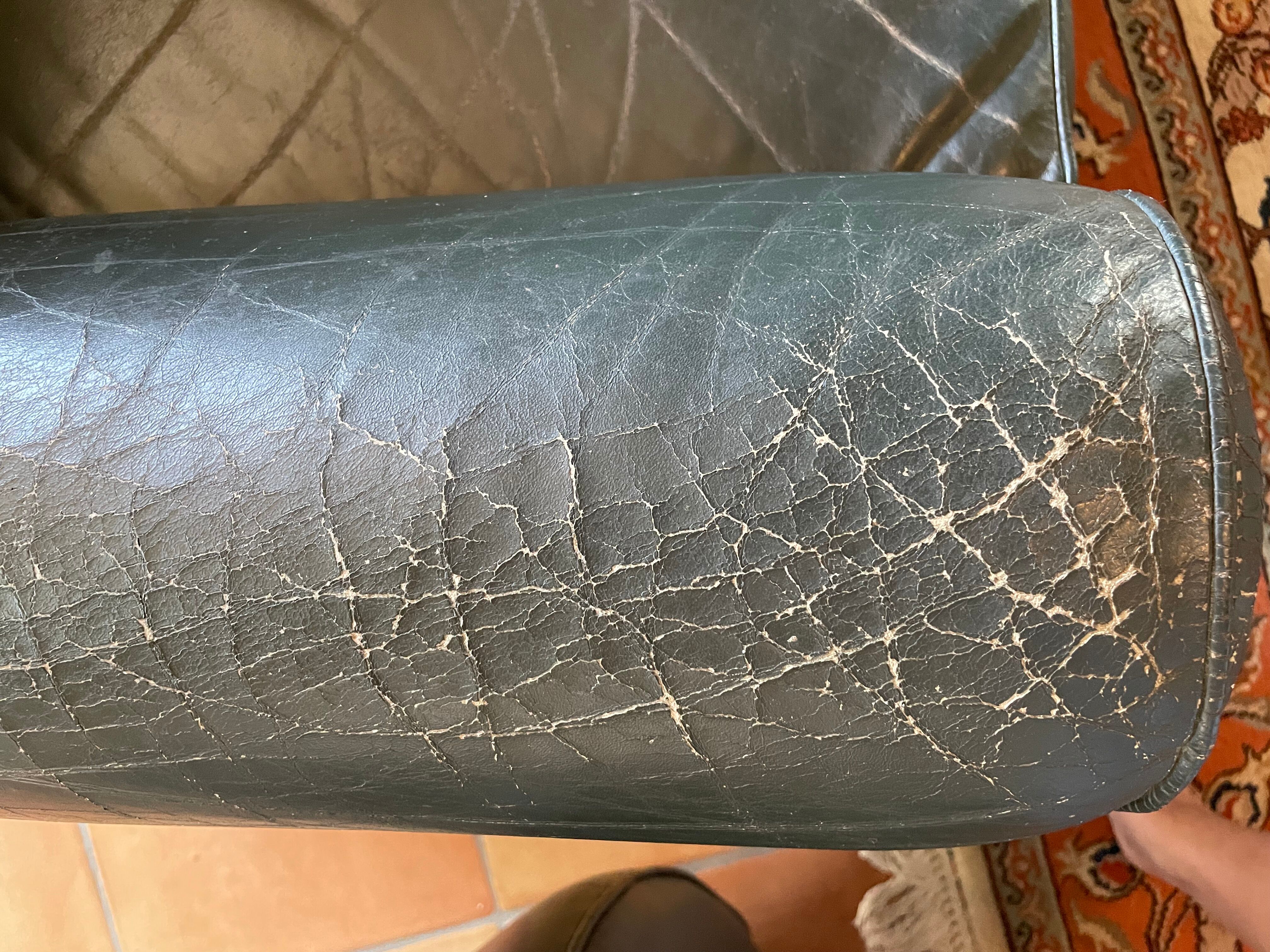 Green leather club chairs