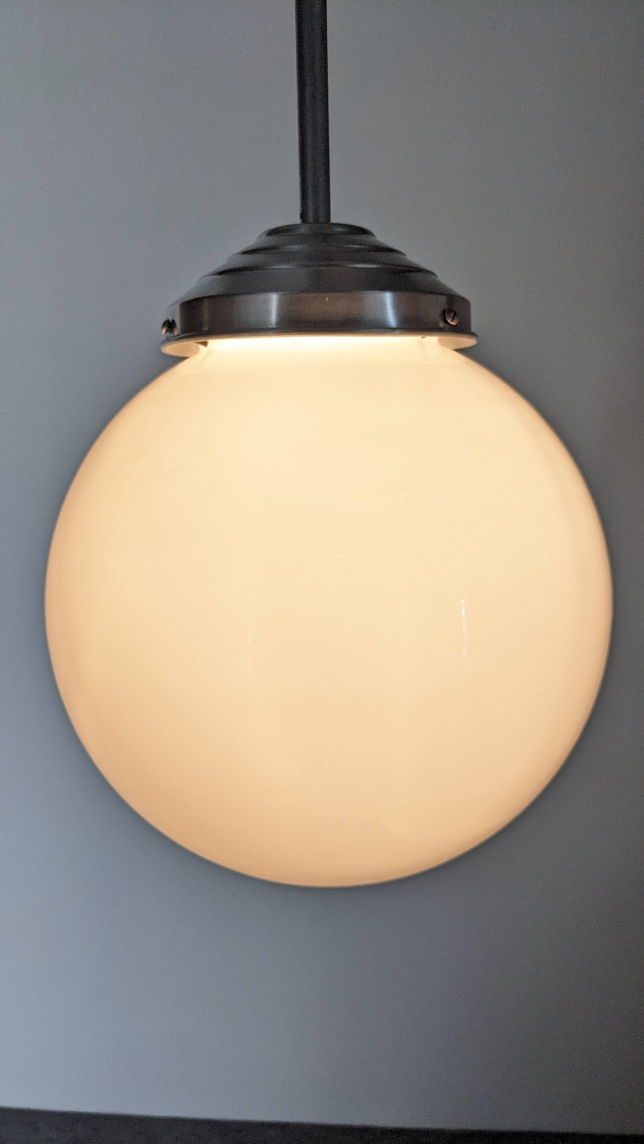 XL Art Deco white opaline suspension light, France circa 1920.