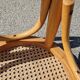 High bar stool in curved wood and cane