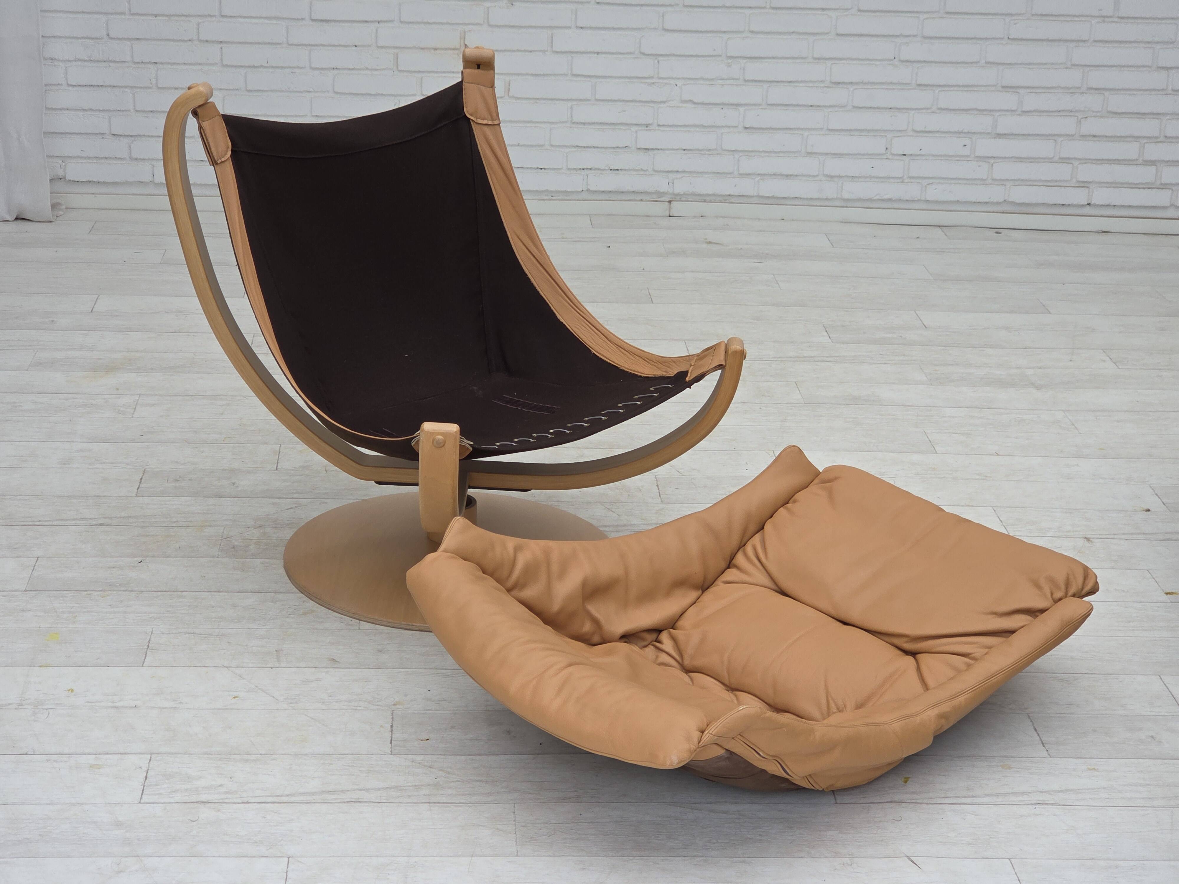 1980s, Scandinavian swivel armchair, furniture leather, bent wood.