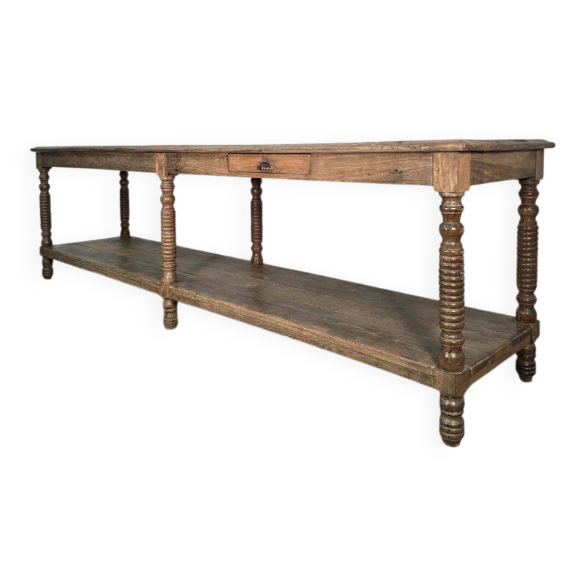 Beautiful 19th-century draper's table in oak with six fluted legs.