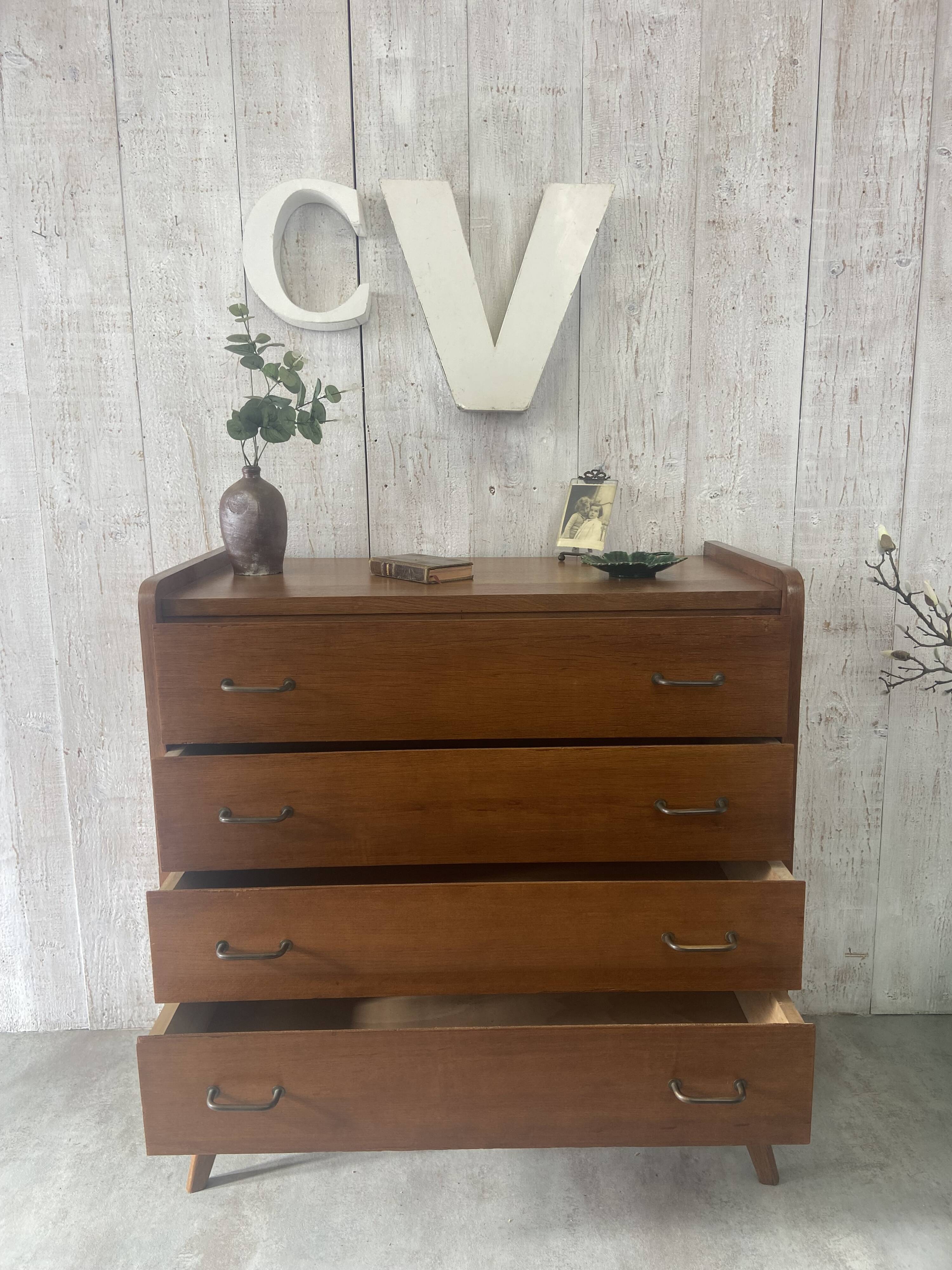 Vintage chest of drawers with tapered legs