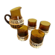 Pitcher and amber glasses and rattan