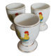 Porcelain egg cups with rooster decoration, set of three