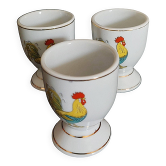 Porcelain egg cups with rooster decoration, set of three