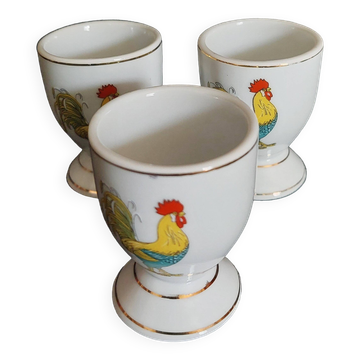 Porcelain egg cups with rooster decoration, set of three