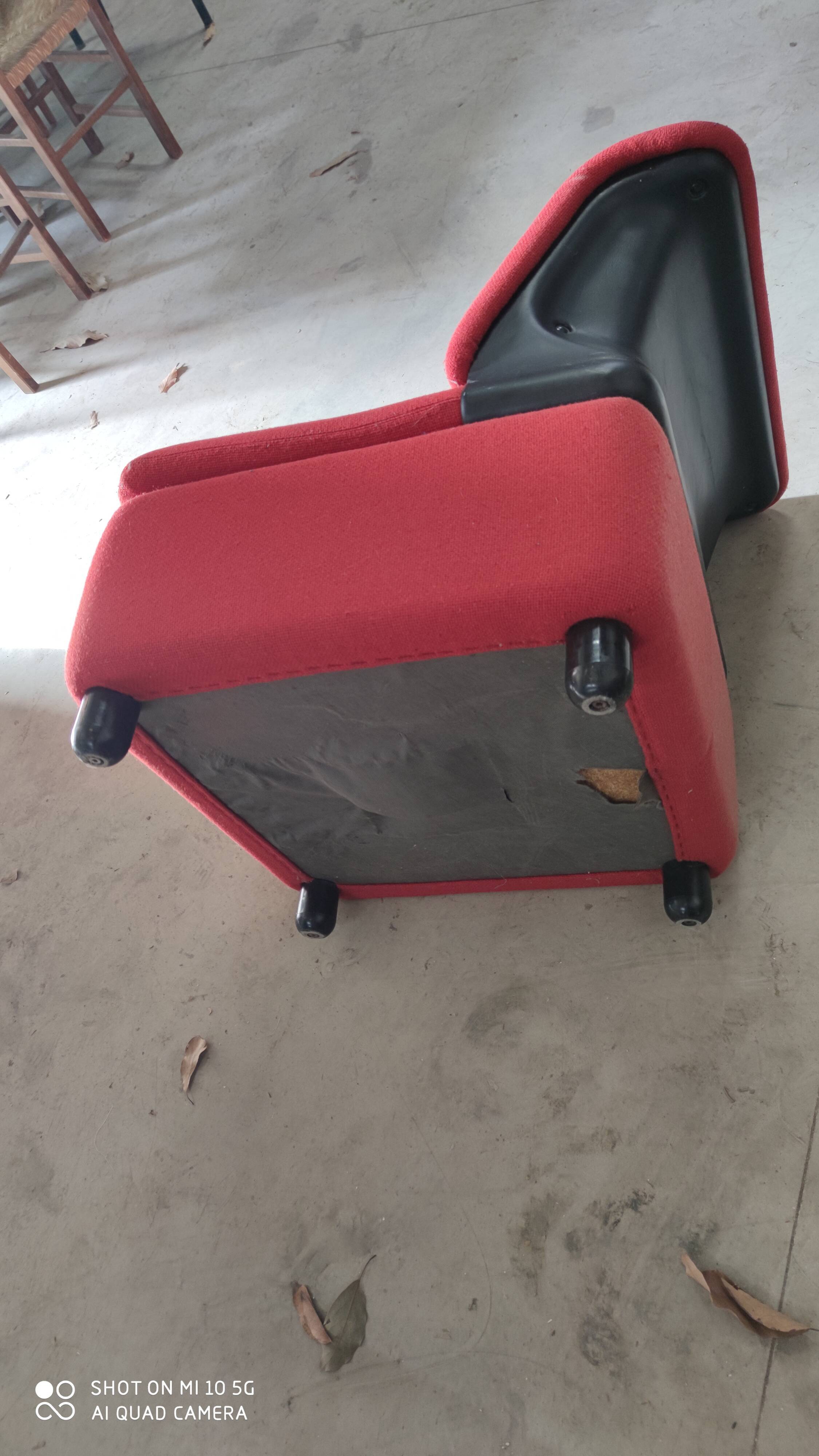 Pair of lounge chairs in red tweed and black vinyl