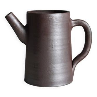 Small pitcher in brown glazed stoneware