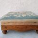 Small antique footrest stool lined canvas