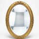 Miroir ovale style Louis XV doré miroir biseauté