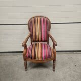 Antique armchair in multi-colored striped velvet with turned legs