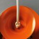 Danish/Swedish hanging lamp, in silver-coloured aluminium with orange interior paint.