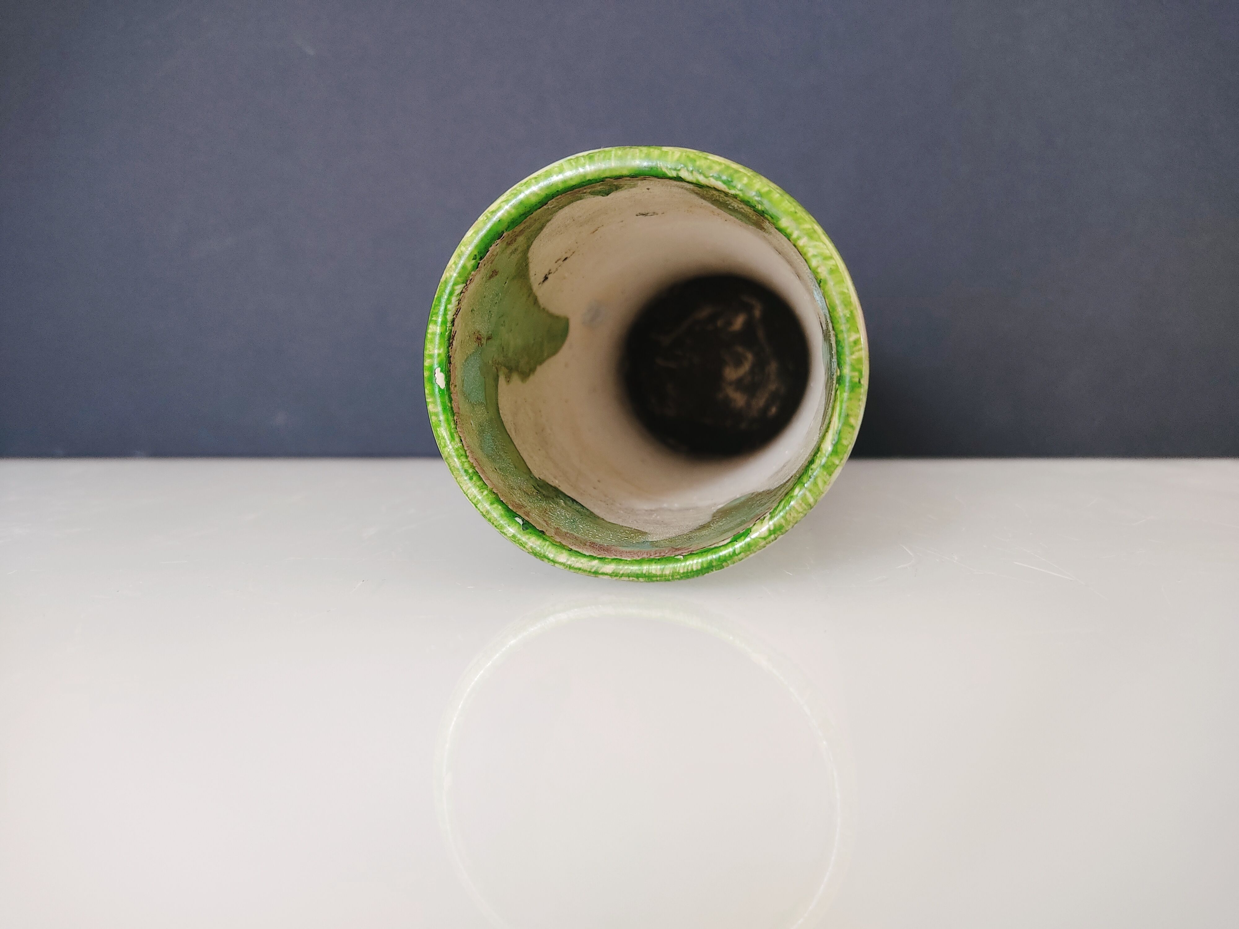 Pale green ceramic roller vase