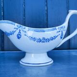 Old earthenware sauce boat