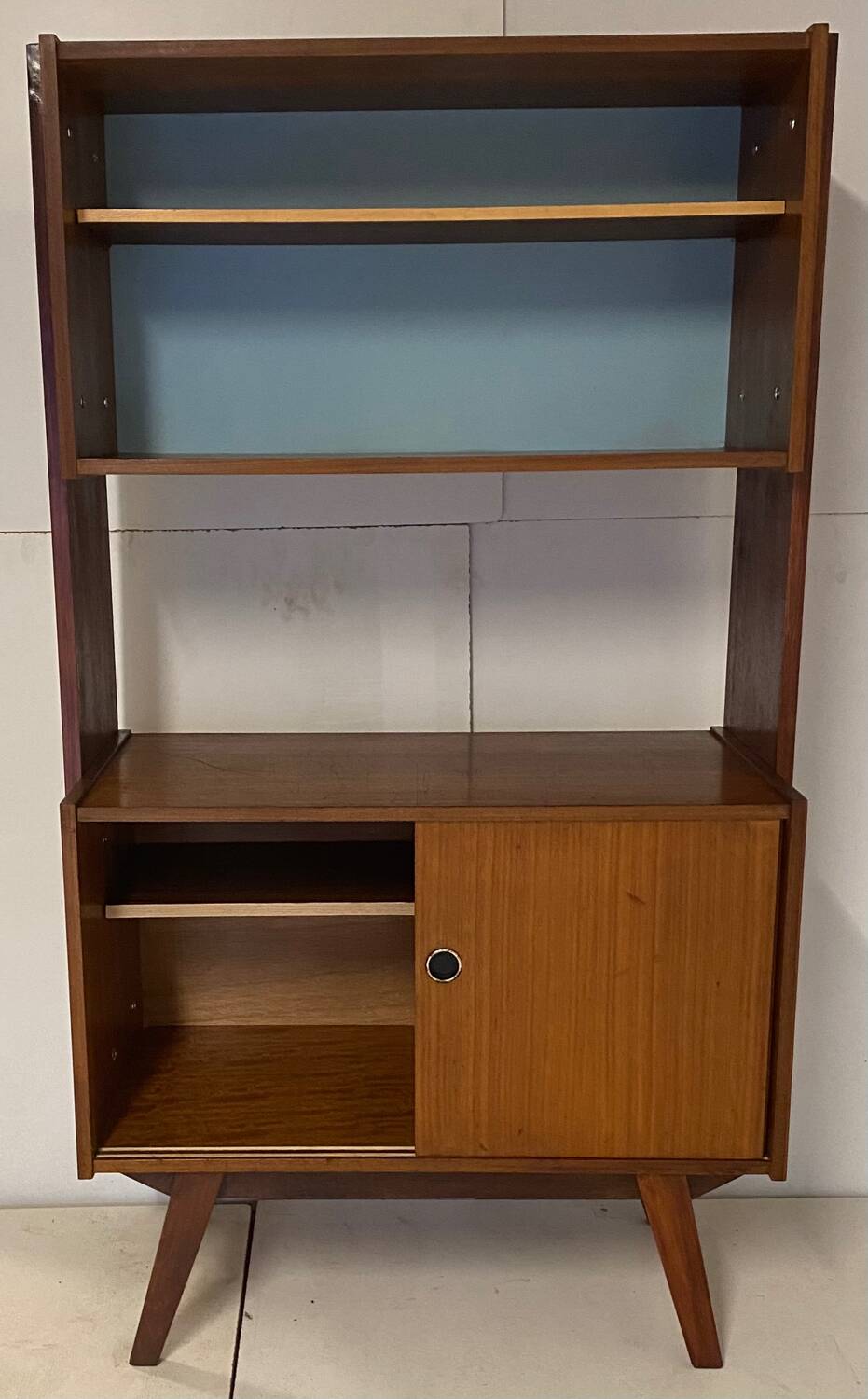 Vintage bookcase with compass feet from the 60s