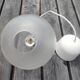 Frosted glass suspension globe with floral patterns in Art Deco style.