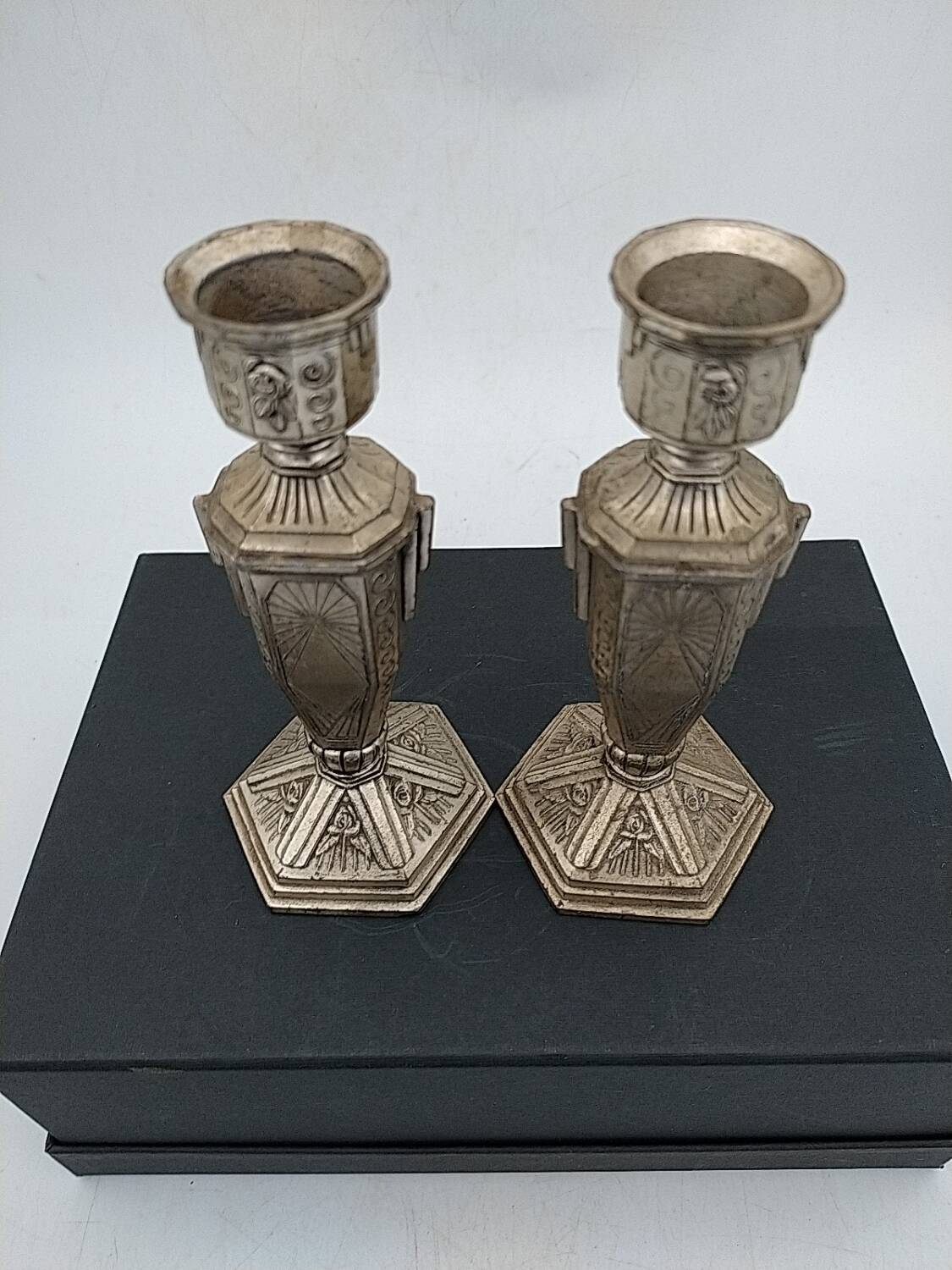Art Deco metal candle holders.