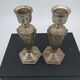 Art Deco metal candle holders.