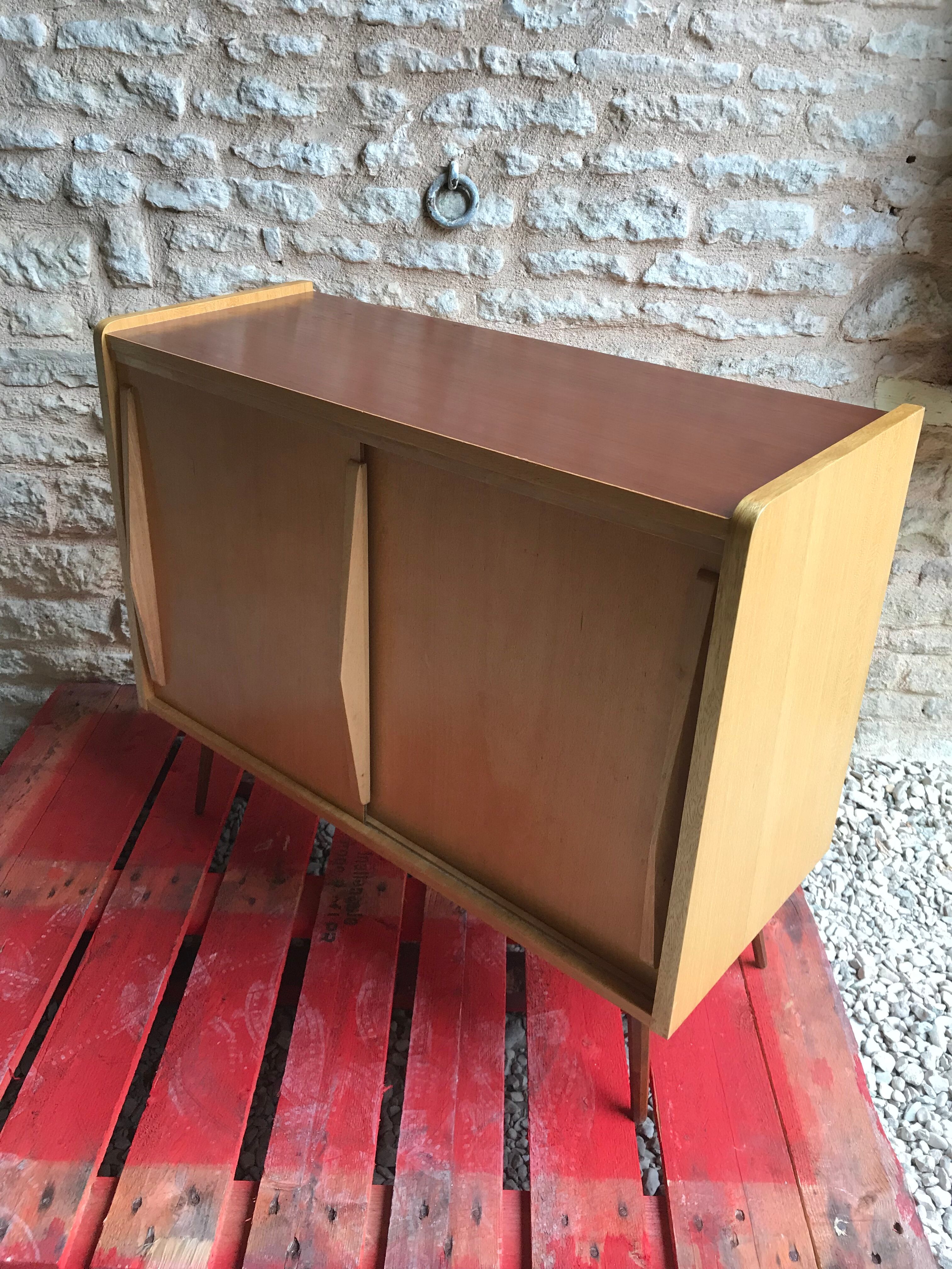 Vintage storage cabinet sliding doors feet compass