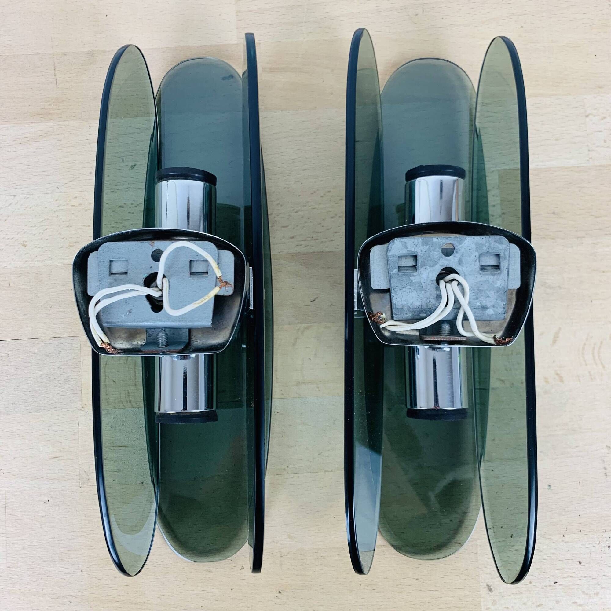 Pair of 70s smoked glass chrome wall lights
