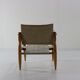 Danish design safari chair with wooden armrests