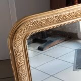 miroir ancien en bois et stuc doré
