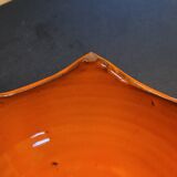 Orange ceramic star-shaped empty bowl