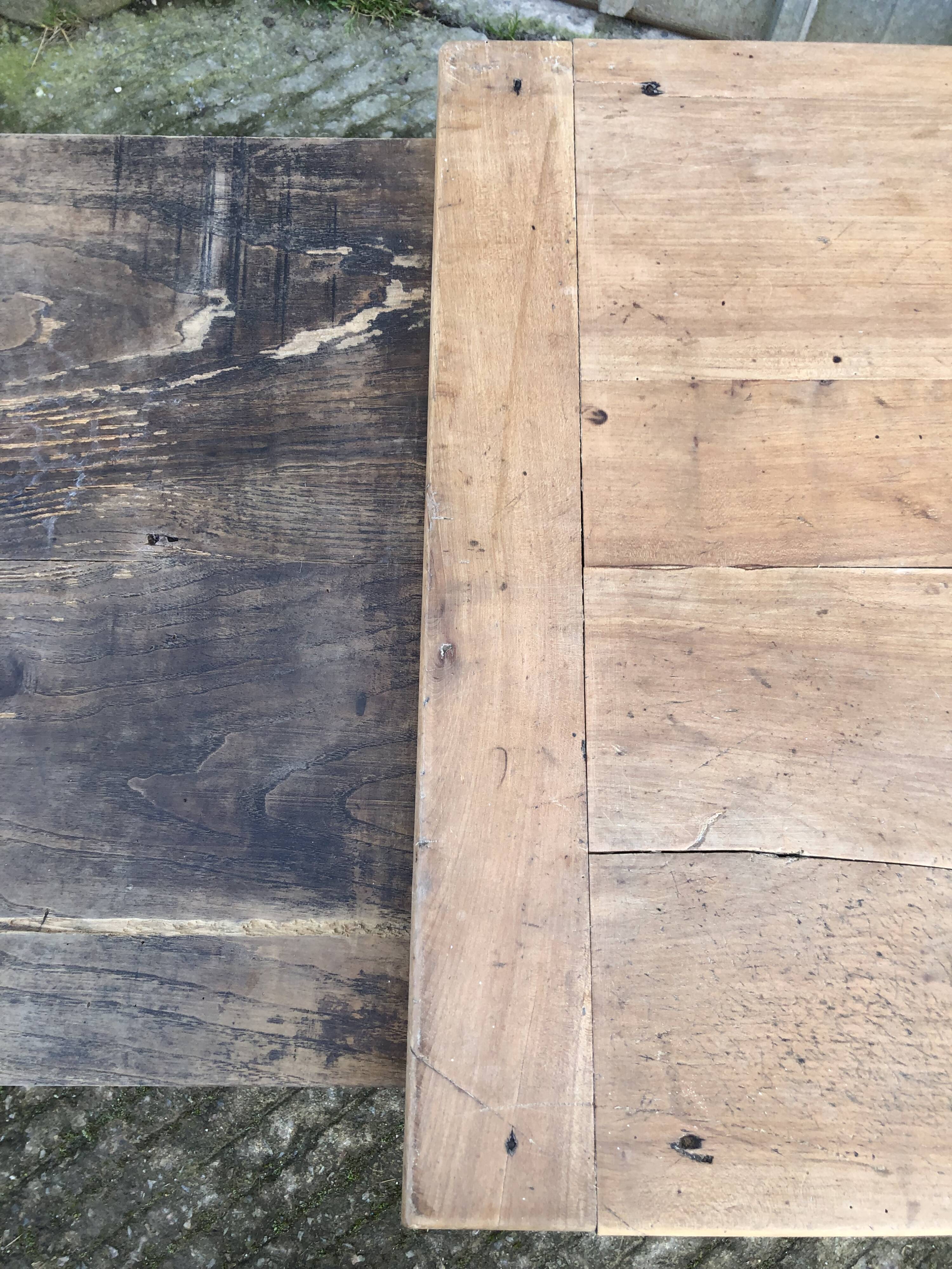 Antique solid cherry farmhouse table with 3 drawers and 1 pull out.