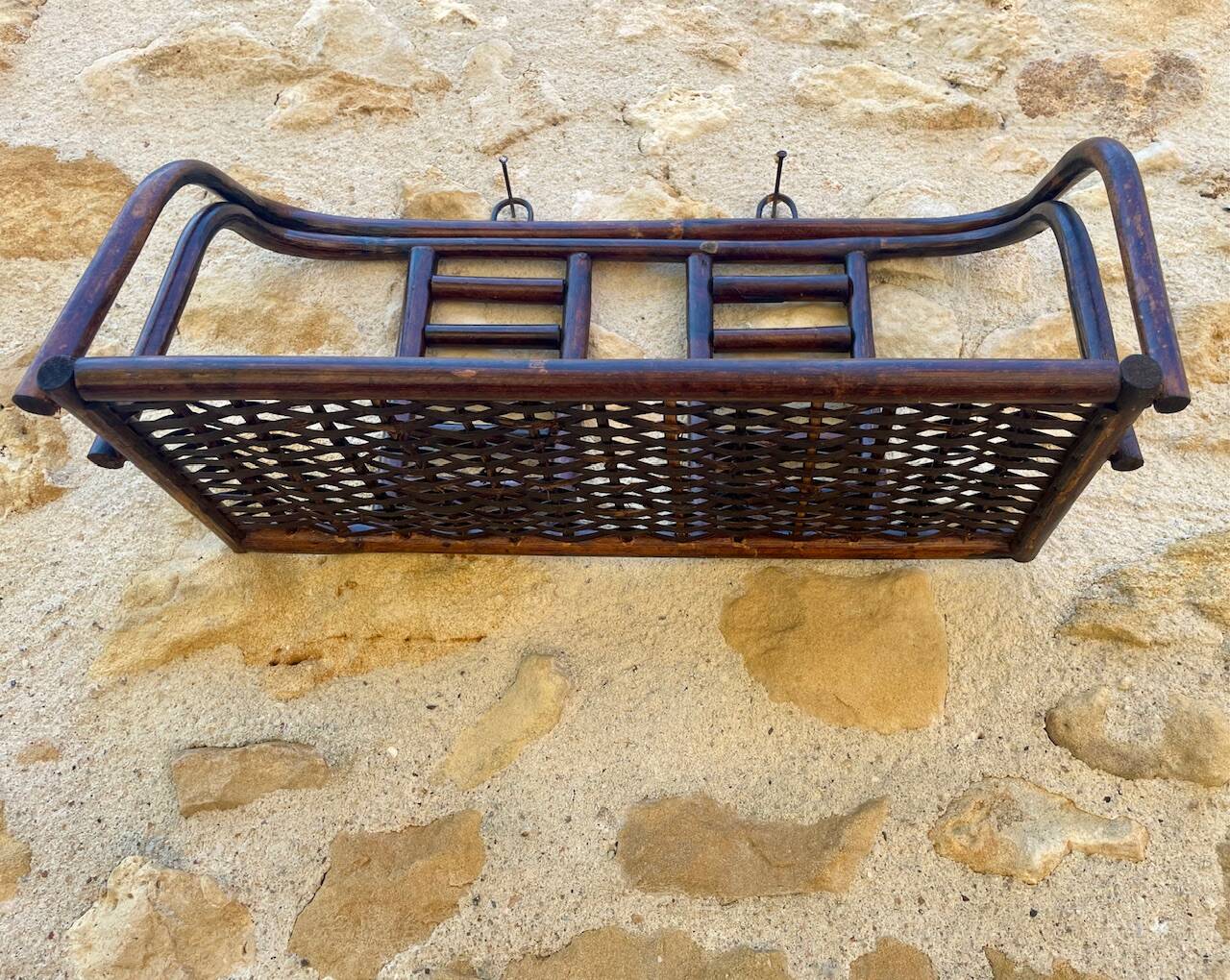 Vintage wall shelf in bamboo and rattan, circa 1960s.