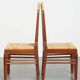Set of four rattan Art Deco design dining chairs with high back