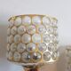 Three gold bronze sconces