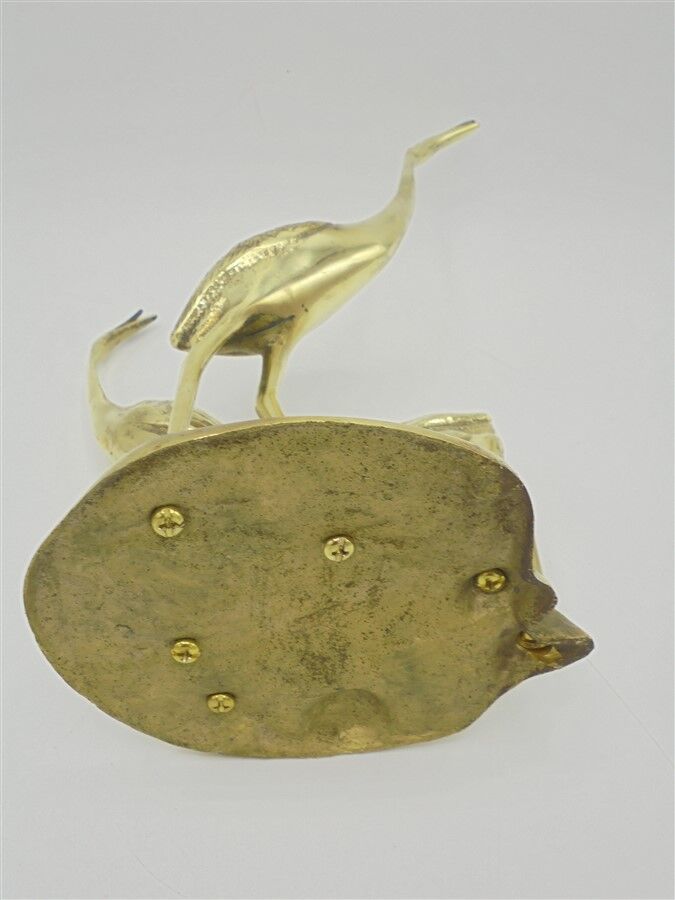 Brass herons