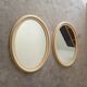 Miroir ovale vintage en bois patiné