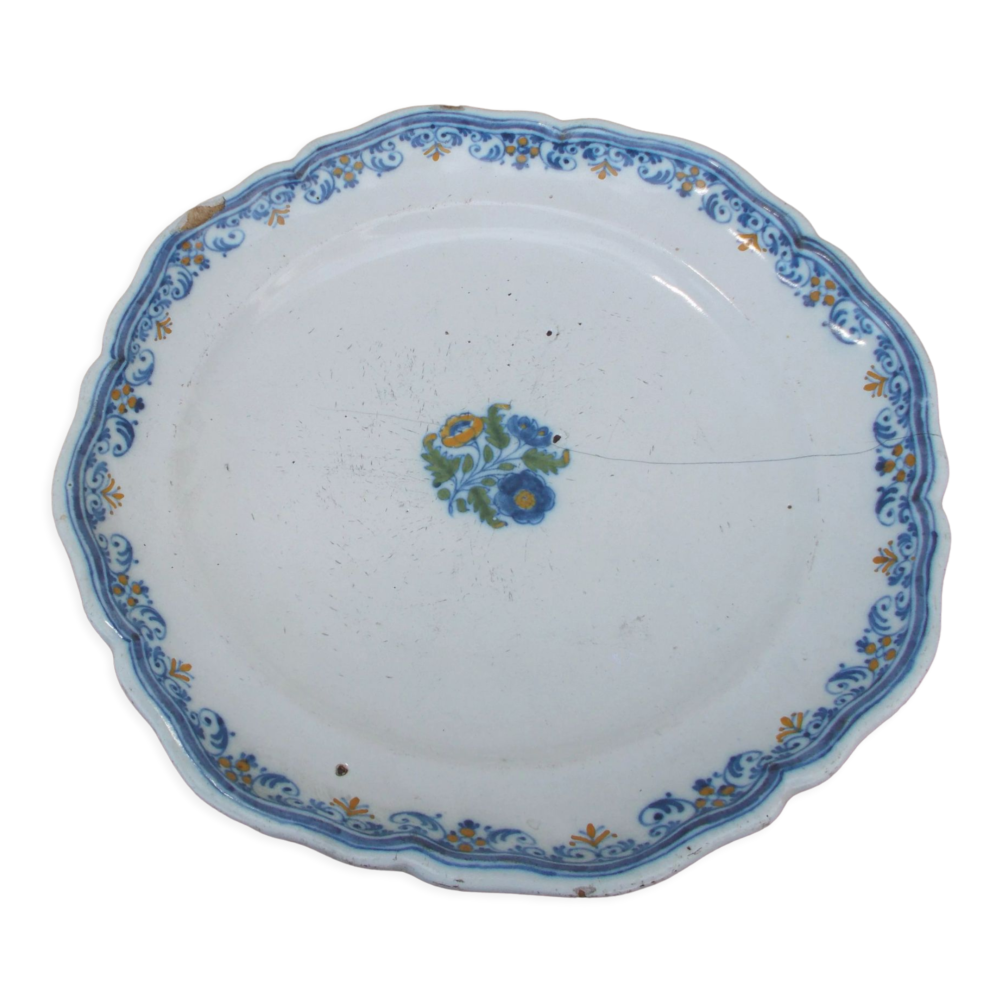 Old faience plate of Moustiers