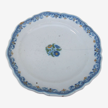 Old faience plate of Moustiers