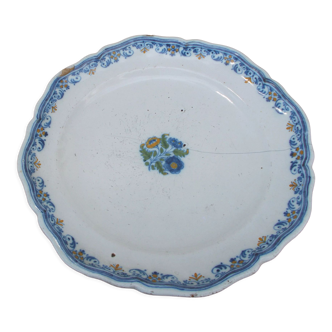 Old faience plate of Moustiers