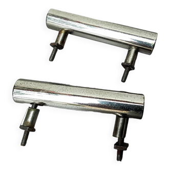 Two chrome drawer handles