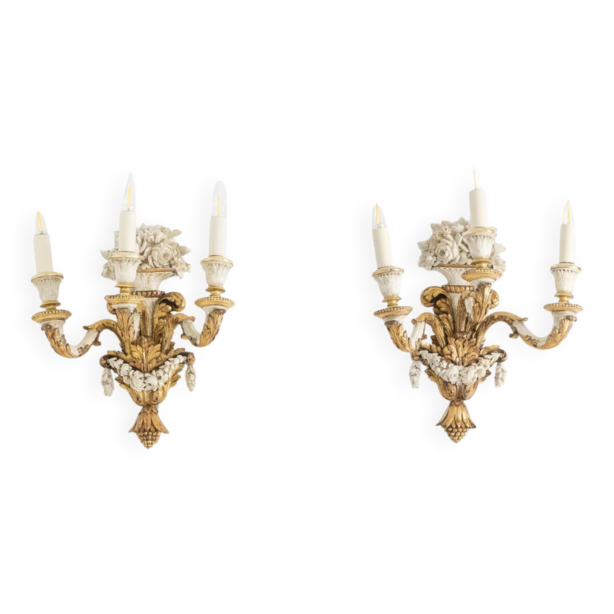 Pair of Louis XVI style wall lights in gilded and lacquered wood. Circa 1900.
