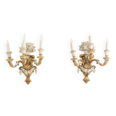 Pair of Louis XVI style wall lights in gilded and lacquered wood. Circa 1900.