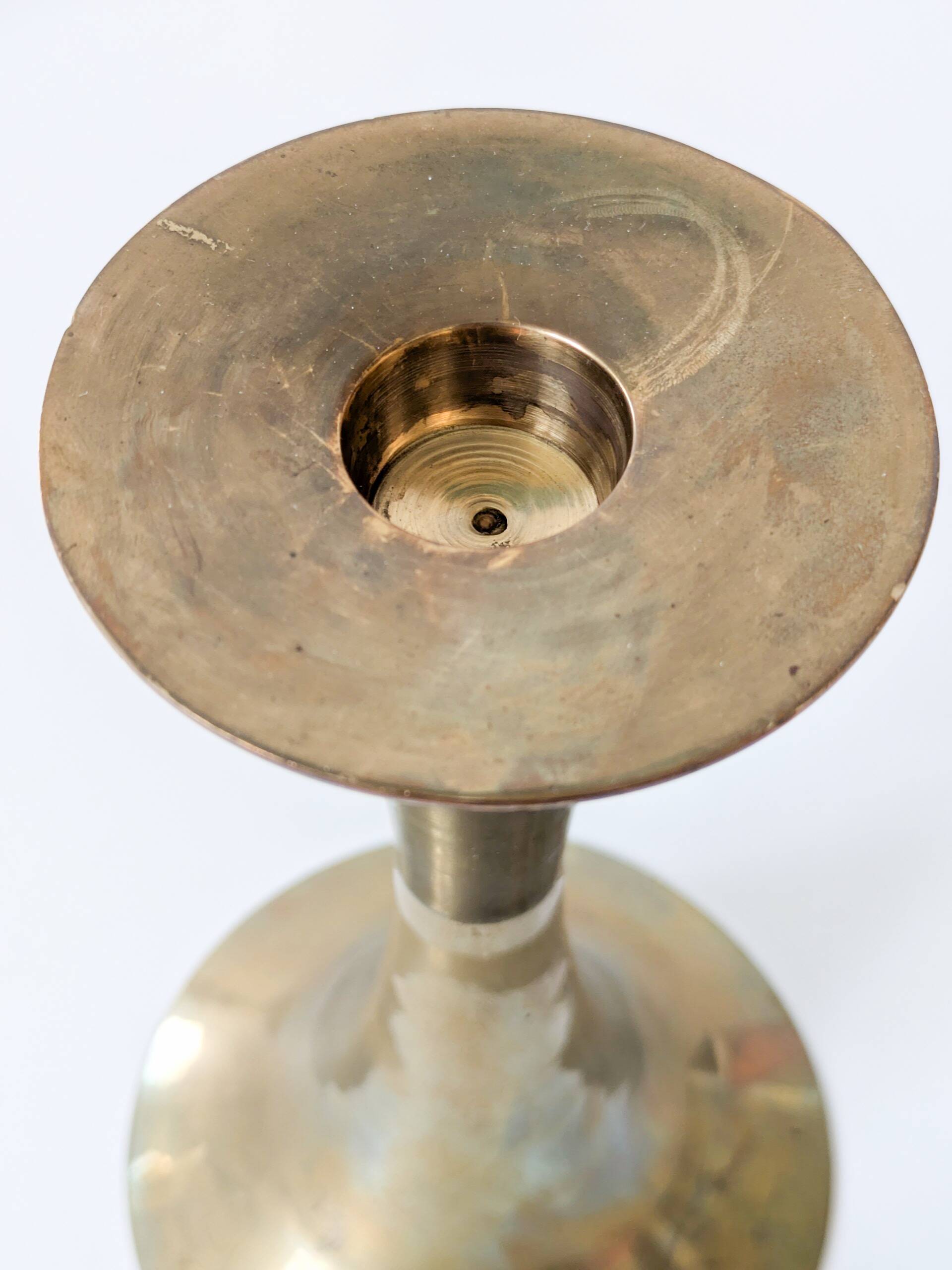 Pair of Midcentury brass candlesticks, flared shape.