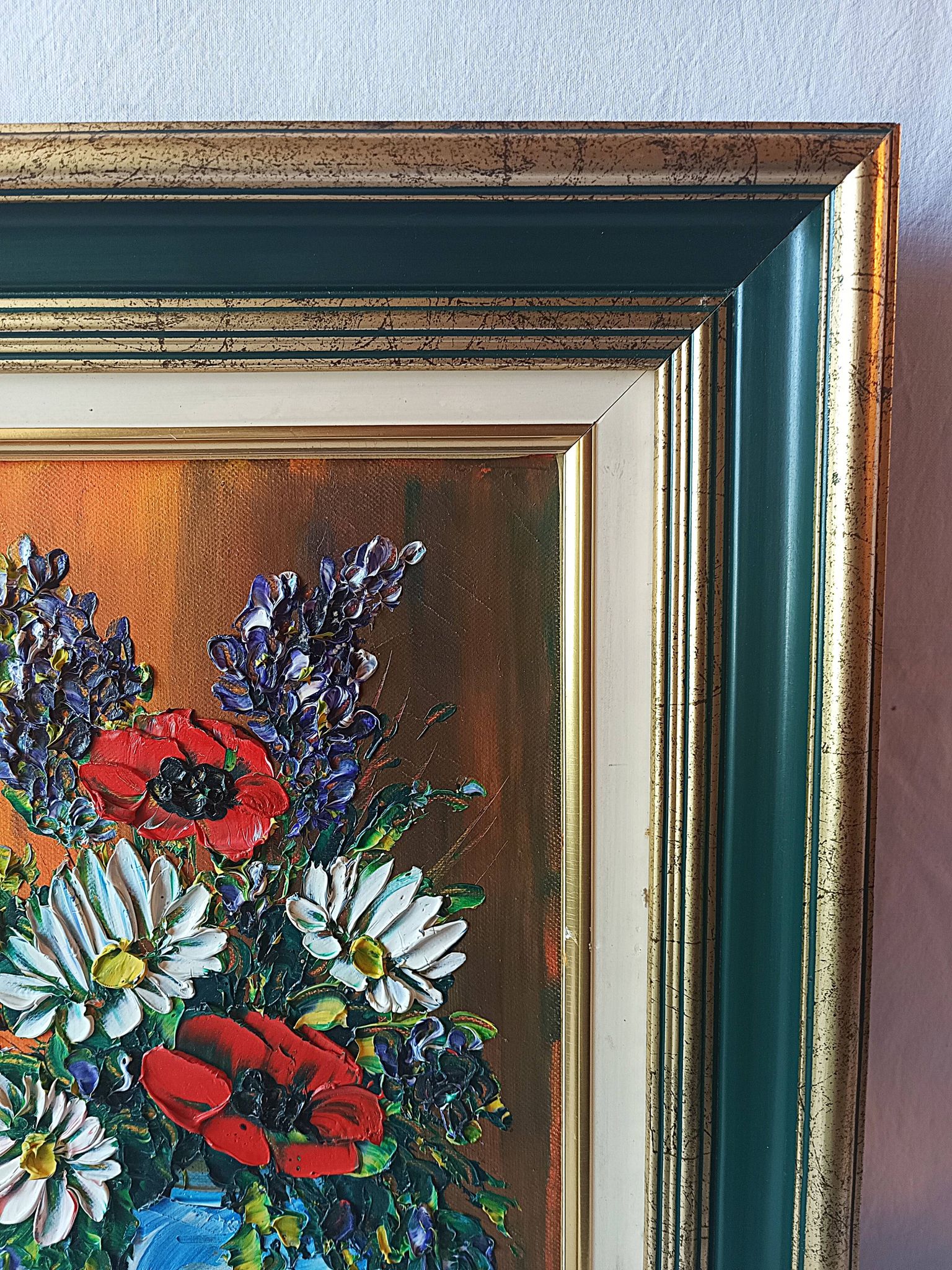 Oil painting on canvas, bouquet of flowers in a framed vase, signed.